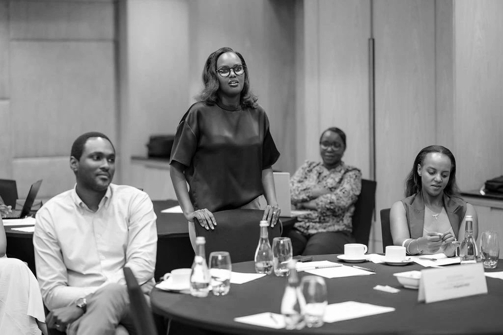 Leaders in discussion at a TES workshop in Rwanda